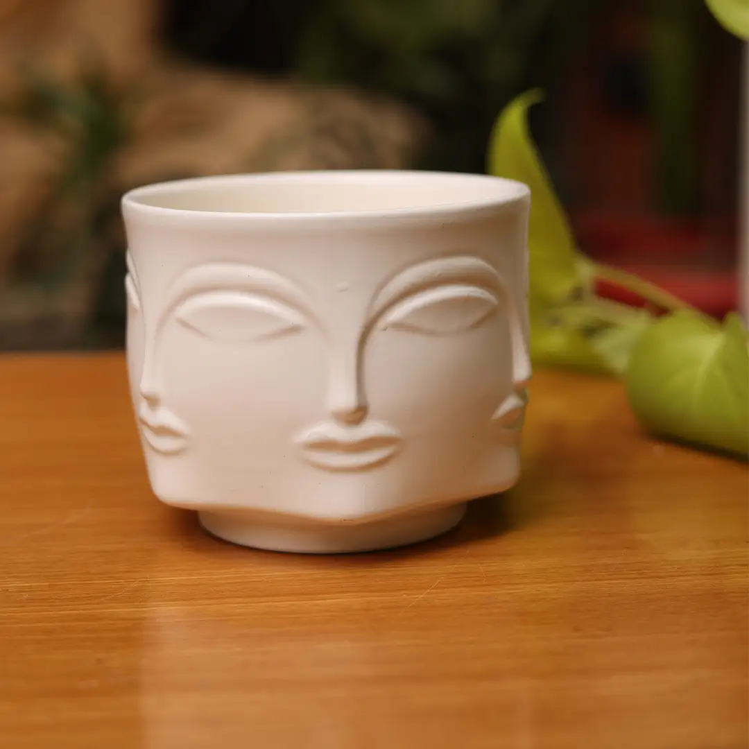buddha-faces-jar-w buddha-faces-jar-w